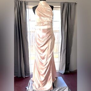High neck w/bow back waist and hips w/fitted pleats leg open mermaid cut w/tail